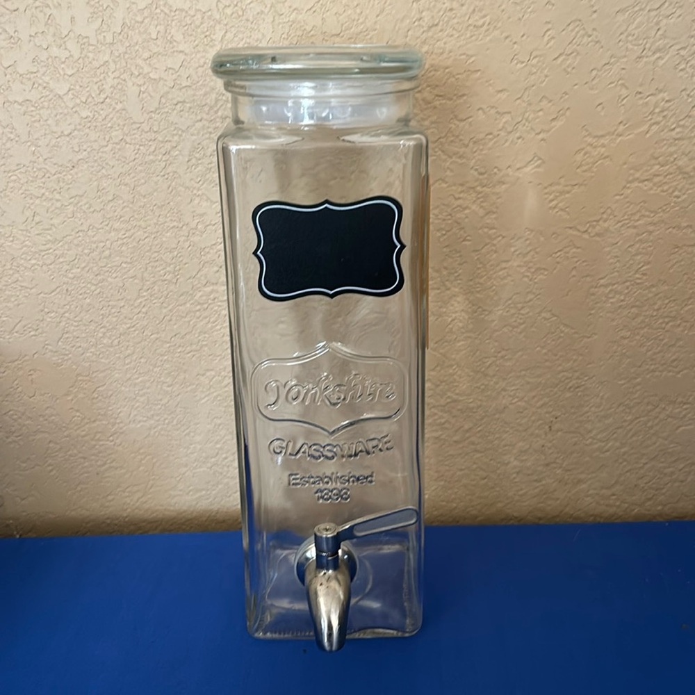 Glassware: drink dispenser with spout. Write label